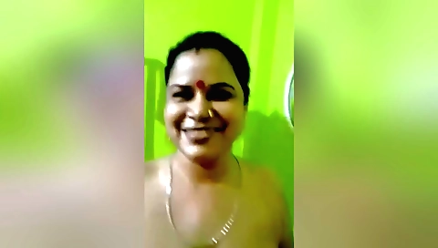 Amateur webcam video showing a brunette in stockings