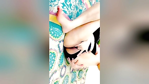 Indian solo female using a cucumber to reach sexual climax