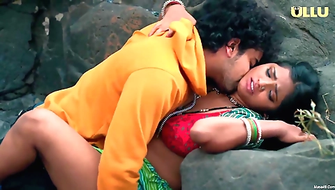 Brunette with long hair gets wet and plays with her hair