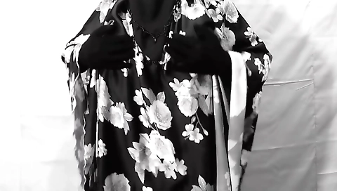 Indian girl is in the pool and making her hair nice