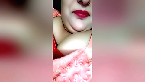 Bhabhi plays with her huge boobs in a homemade video
