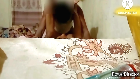 Amature brunette playing with a toy in front of a webcam