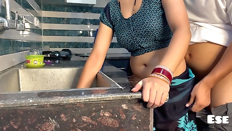 Indian amateur fuck in the kitchen with her husband
