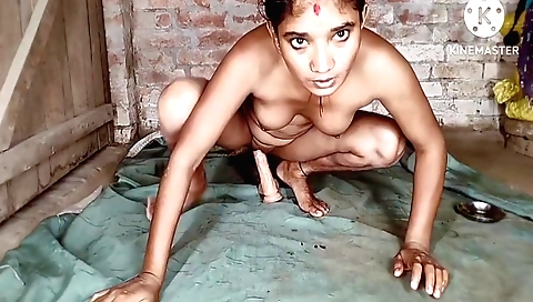 Indian girl with a nice face and a nice body is playing with a toy