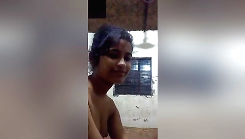 Indian beauty showing her small breasts in a solo video