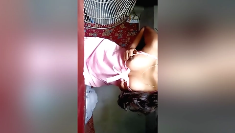 Indian amateur woman in sexy dress is filmed in solo