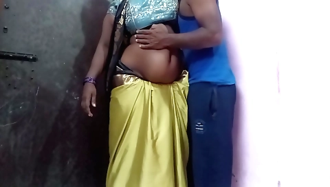 Indian pornstar in a sexy dress standing type porn video