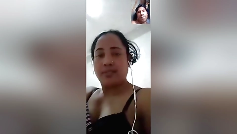 Sexy brunette showing her small boobs in a webcam vid