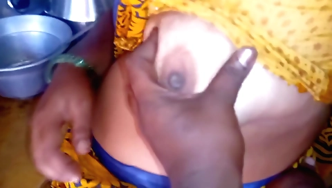 Indian woman cooking her favorite recipe on the table