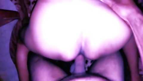 Sexy Asian milf is fucking herself in an amateur porn film