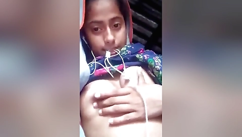 Busty brunette girl with a sexy body is showing off