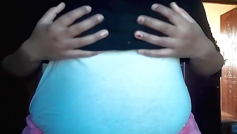 Brunette with big tits masturbates with her fingers