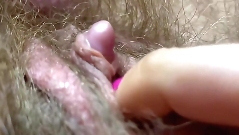 Indian babe fucks herself and shows off her hairy pussy