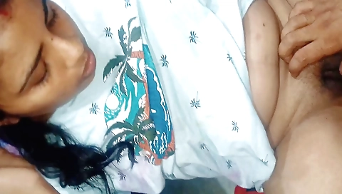 A sexy brunette in a bikini is fingered in one hot video scene