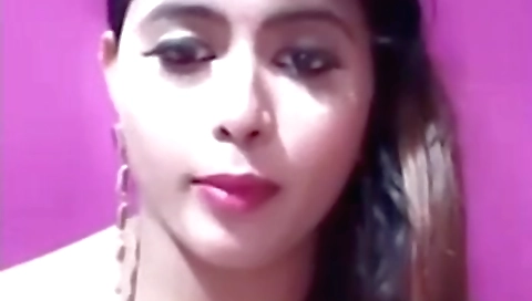 Busty brunette with big natural tits shows off her body