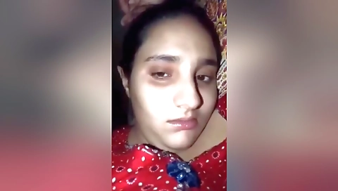 Busty brunette babe with a sexy black dress shows off