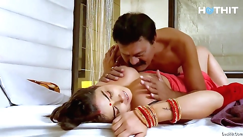 Busty long-haired brunette with big tits riding hard dick