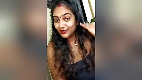 Indian brunette with big boobs shows off and plays with pussy