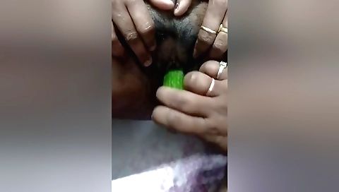 Indian hairy babe with hairy pussy gets penetrated by a toy