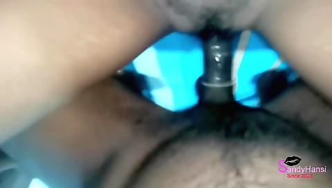 Sexy brunette in red bikini doing some hot stuff on bed