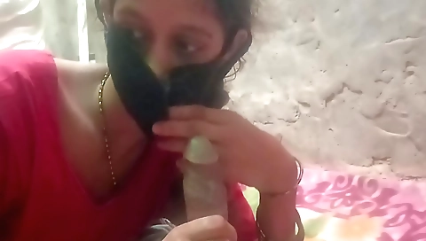 Indian slut with small tits does a handjob on the bed
