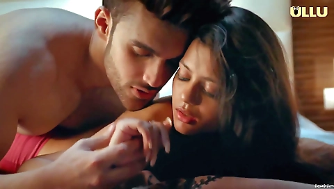 Brunette with a small tattoo and a nice face is wearing sexy clothes