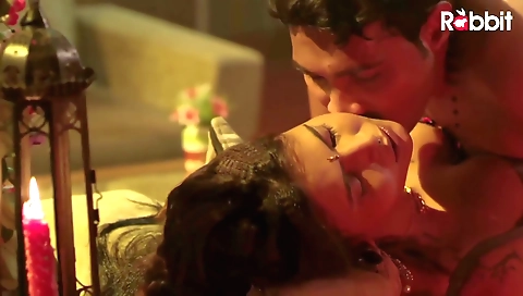 Brunette milf with a nice body and big tits is playing with hair