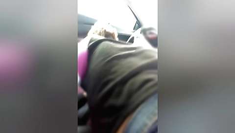 Sexy brunette teen 18+ with fake lips in a parking lot