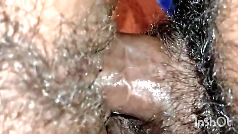 Indian amateur girl wears a white sweater and shorts